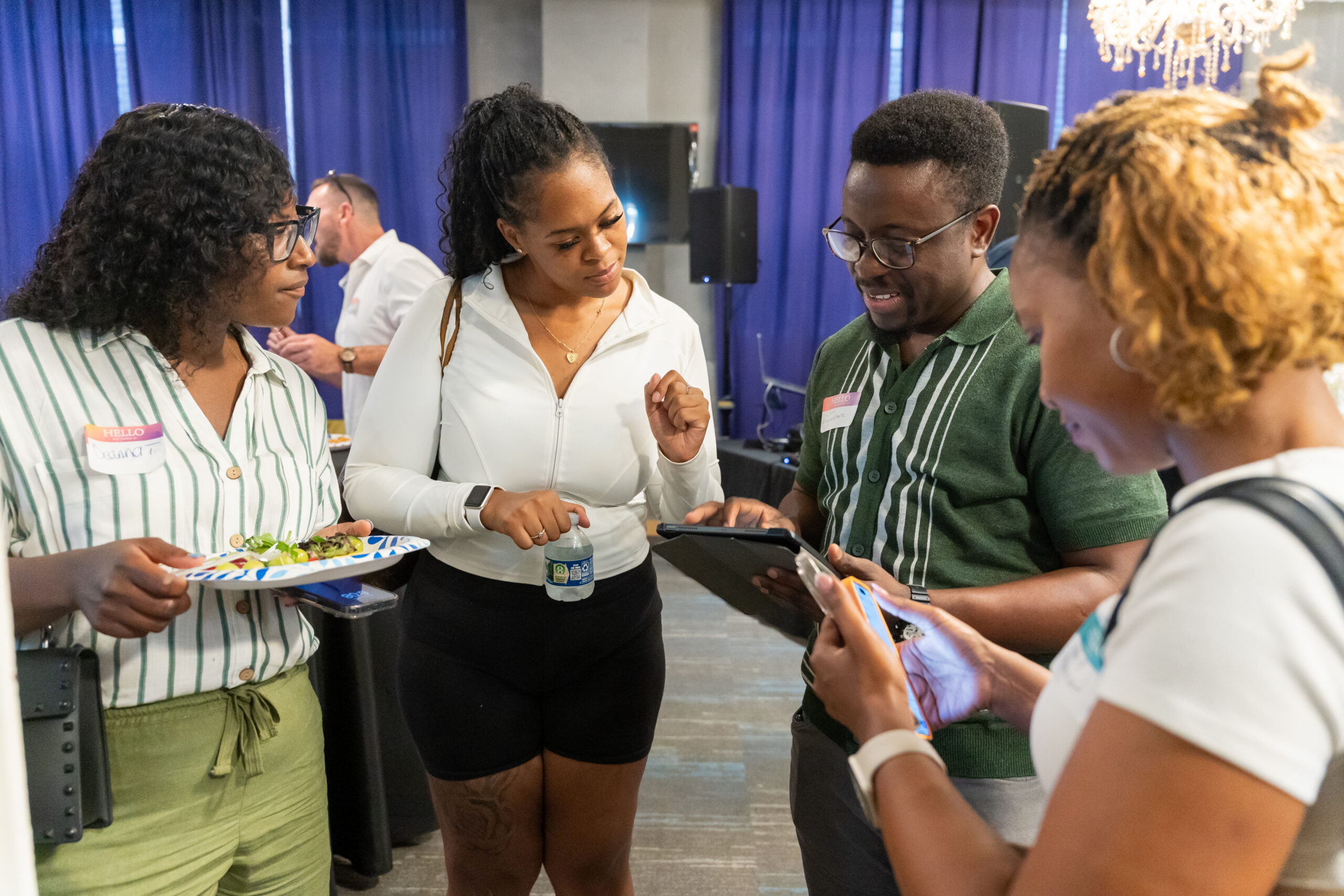 Entrepreneurs making connections at a BBEsquared community gathering
